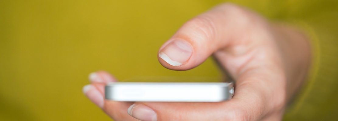 Hand holding smartphone