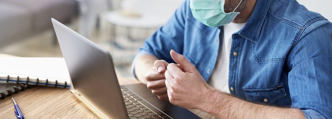 Man working home while coronavirus pandemic