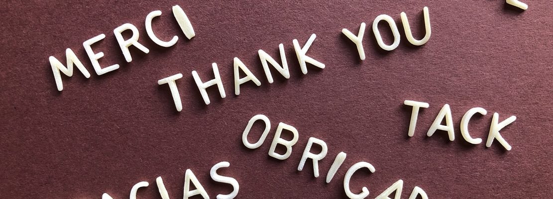 Thank you in different languages including French/ Merci
