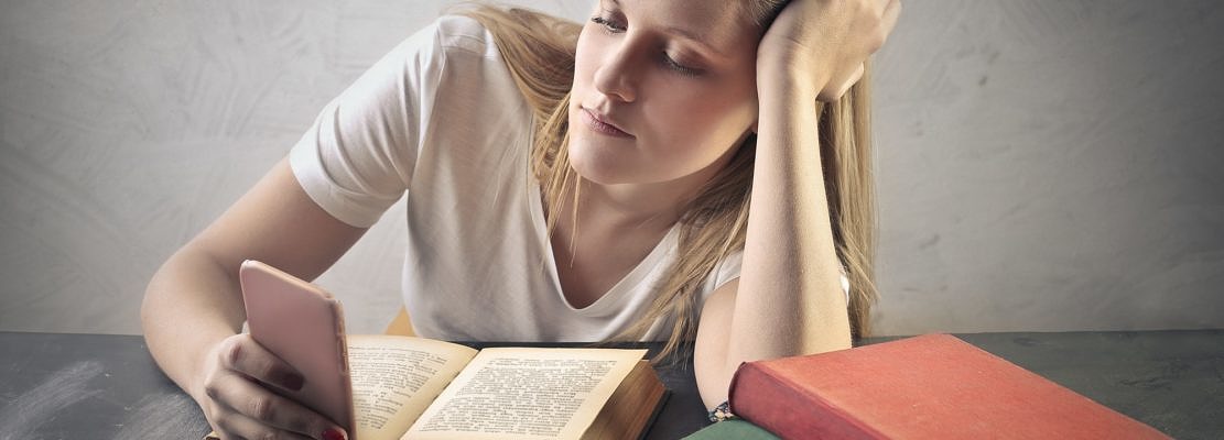 Student girl with a smartphone