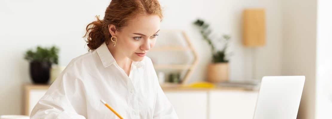 Tailor using personal computer laptop at home