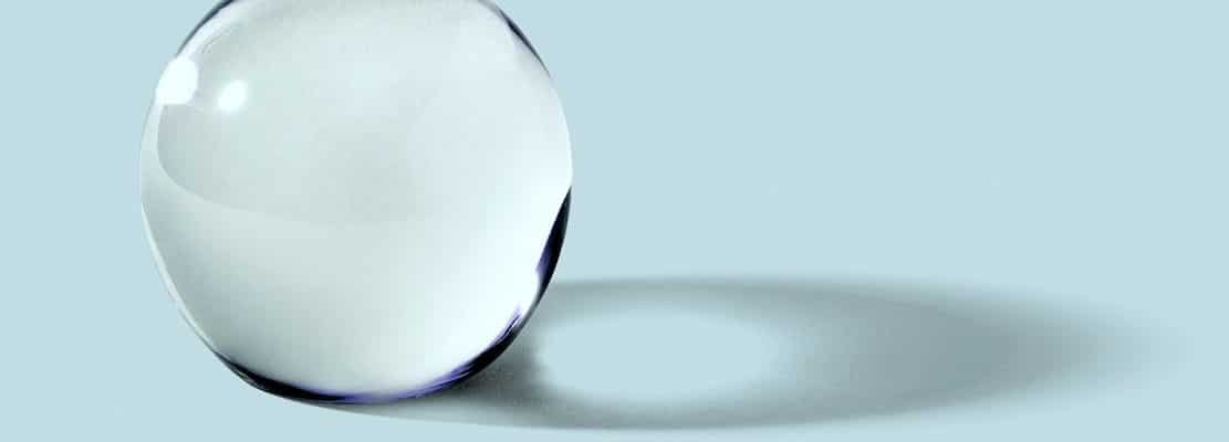 Glass ball or orb on blue background
