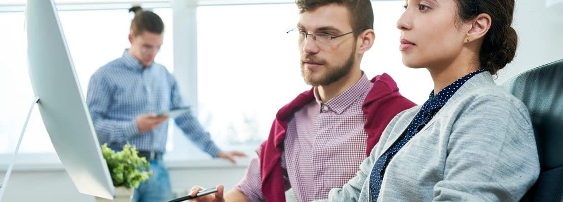 Manager teaching new employee