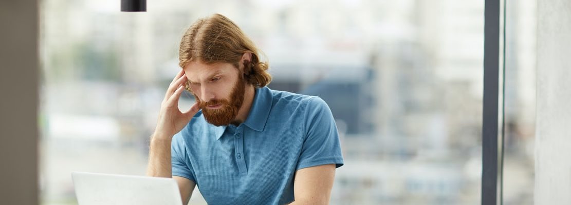 Businessman working on laptop at office