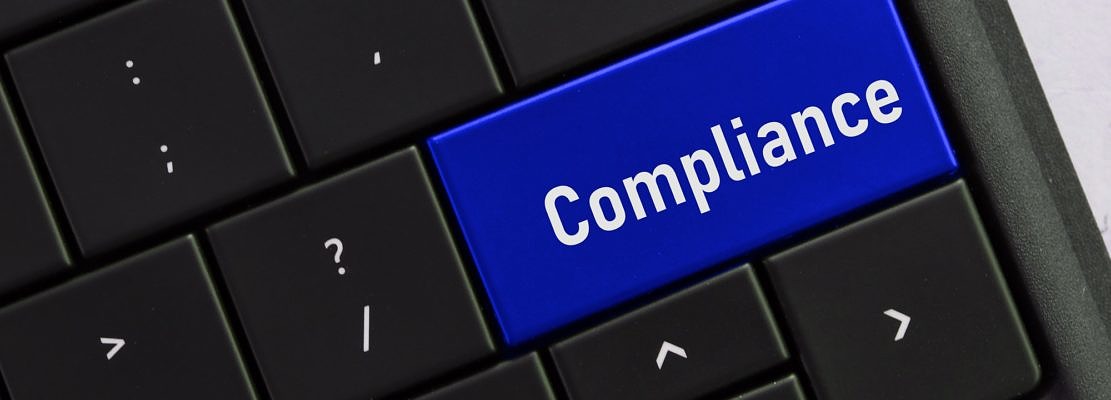 Computer keyboard with a COMPLIANCE button. Concept - changing procedures to adhere to regulations