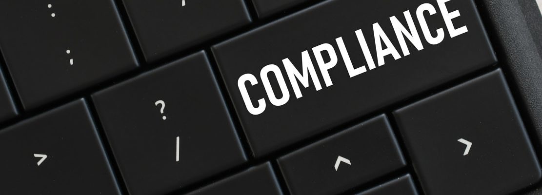 Computer keyboard with a COMPLIANCE button. Concept - changing procedures to adhere to regulations
