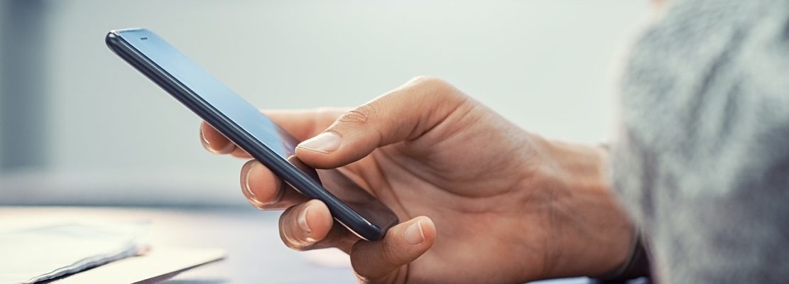 Woman hand using smartphone