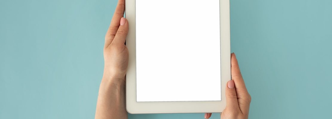 Woman holding digital tablet with empty screen for your design, website or advertisement, blue
