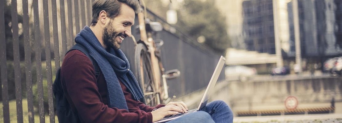 Man with a laptop outdoor