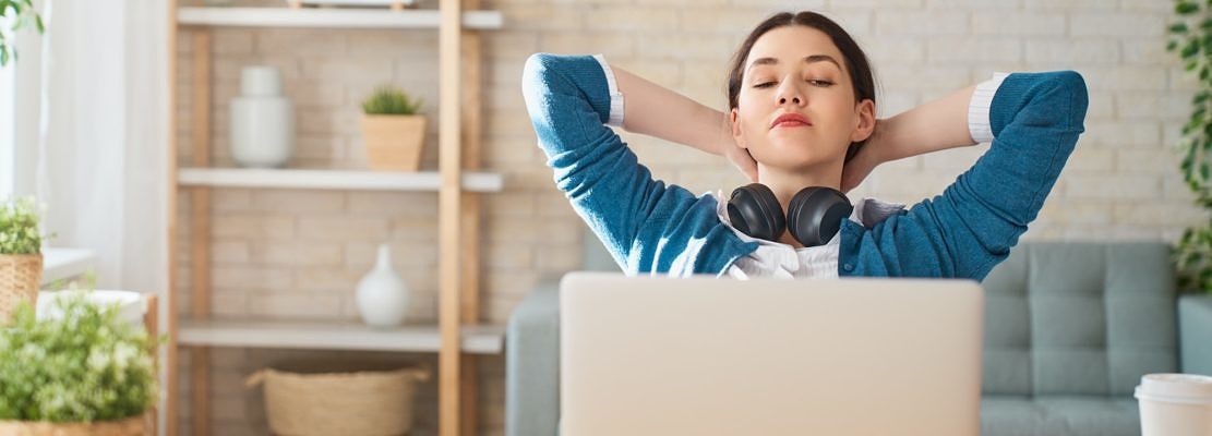 woman working on a laptop at home.