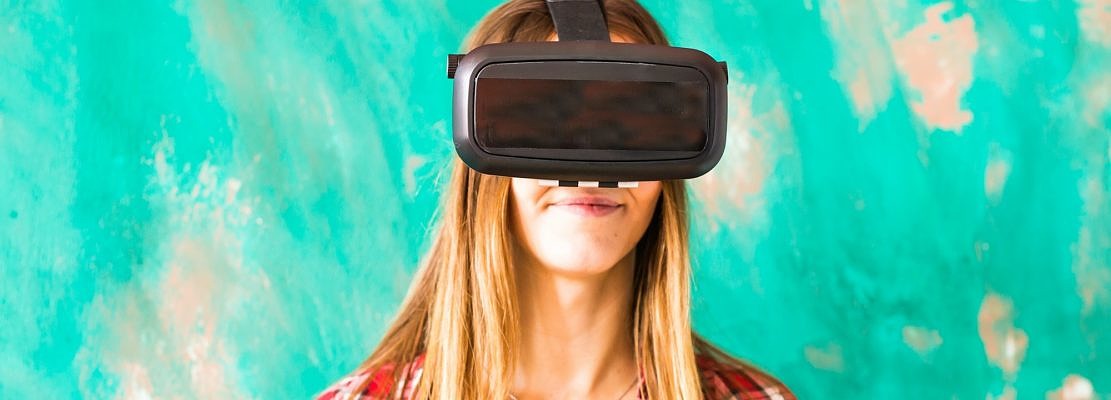 Young Woman Wearing Virtual Reality Headset