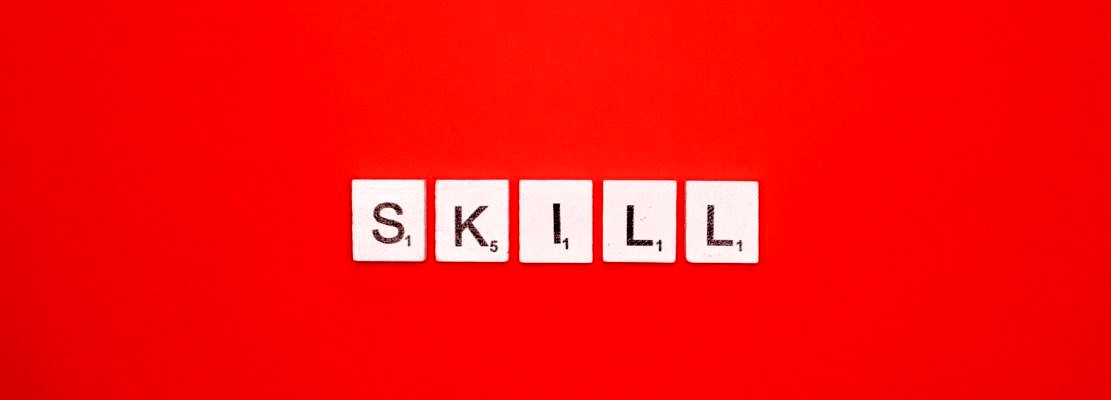 Skill scrabble letters word on a red background