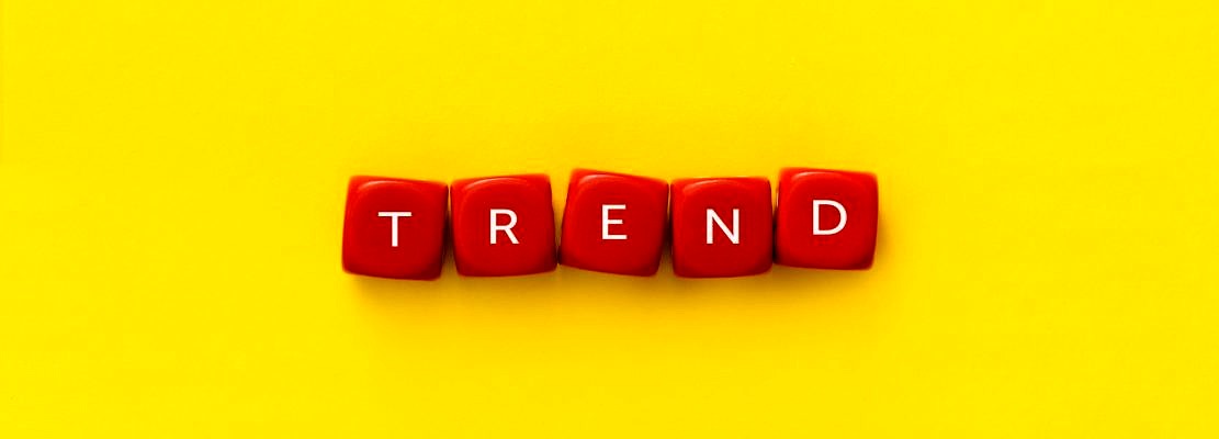 The word "Trend" on a red cubes