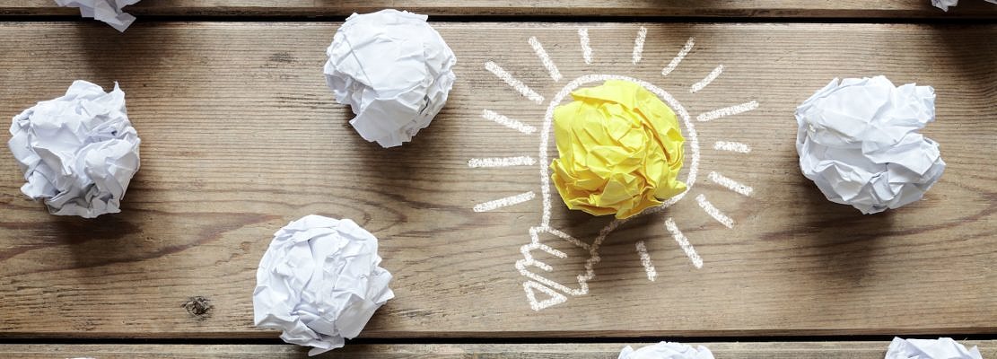 Good idea crumpled paper light bulb metaphor