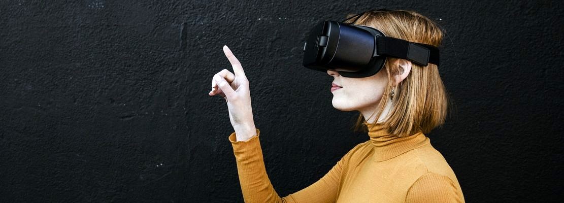 Woman tapping on a VR command
