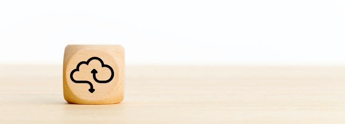 Cloud computing icon on wooden block