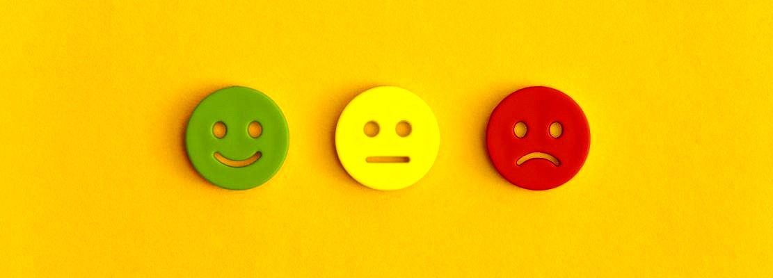 Emoticon smile on a yellow background. Customer feedback.