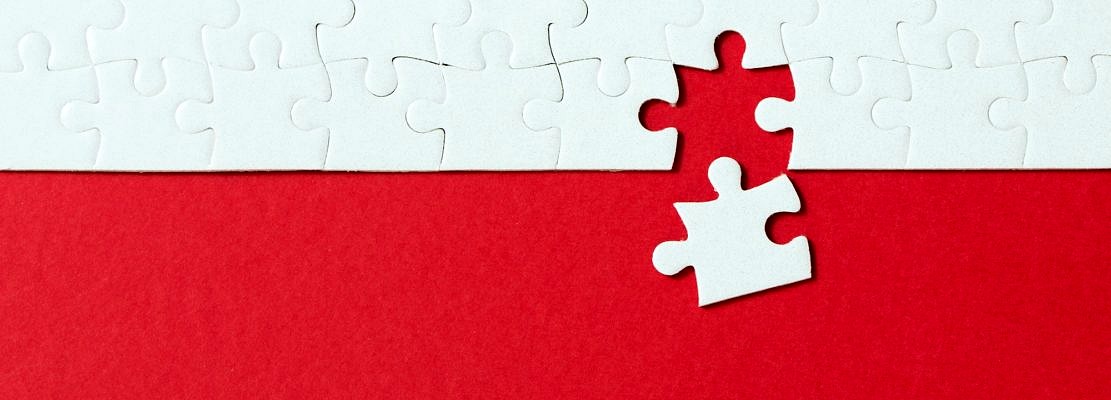 Red background made from jigsaw puzzle