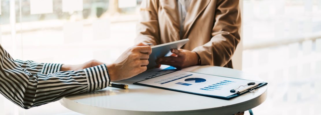 Group of business consultant working by digital tablet and management big data and analyze financial