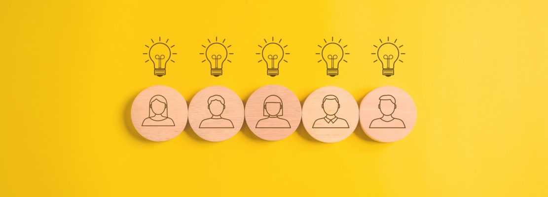 People employees icons on wooden blocks, Business and teamwork concept, Unity of company,