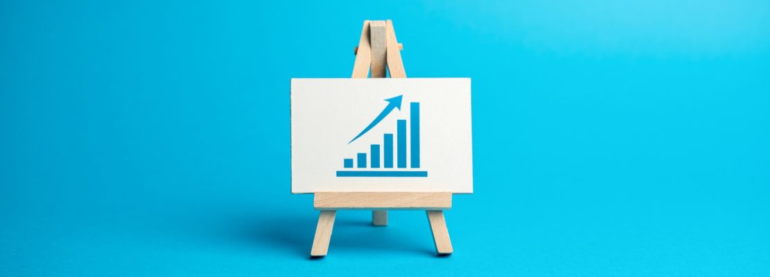 Easel with a up trend graph.