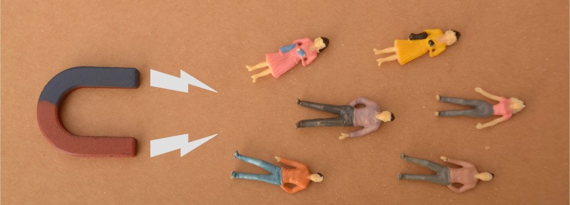 magnet picking the perfect new team member,emphasizing the power of attraction in talent acquisition