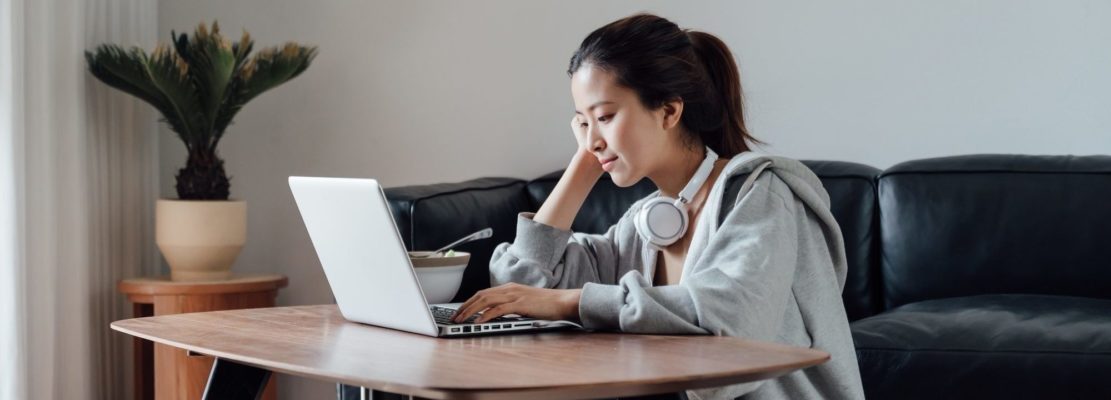 Young Asian woman working on a laptop