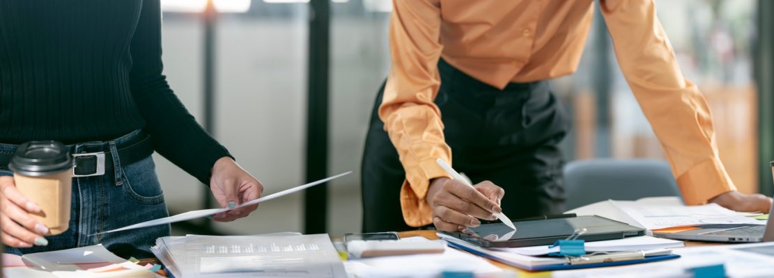 . business people talking, planning analyze investment and marketing on tablet in office.