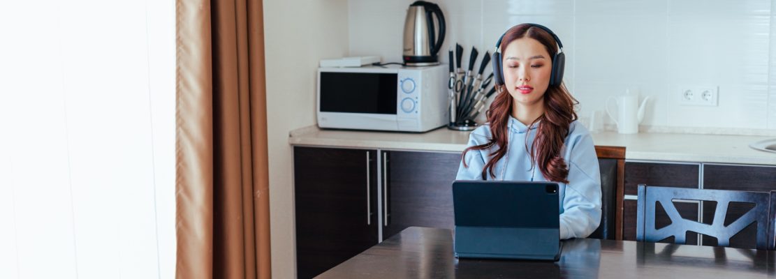 Freelance asian woman working at home