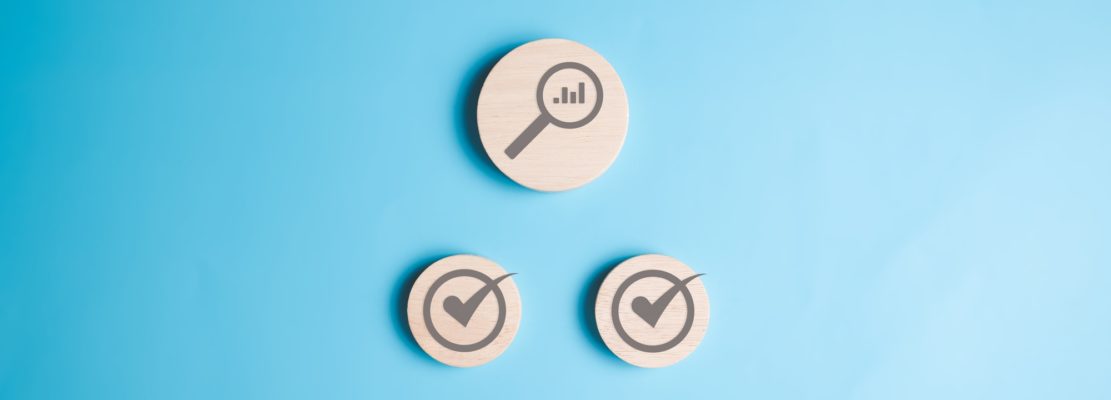 Graph and correct checkmark sign on wooden blocks