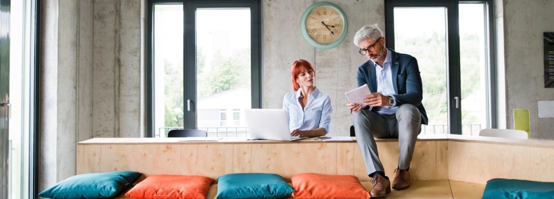 Business people in the office consulting a project.