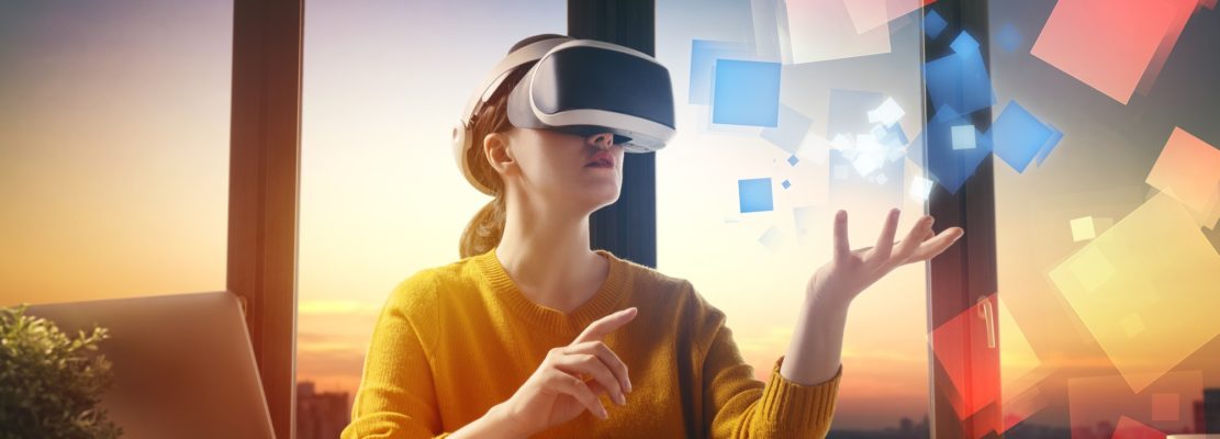 Woman with VR virtual reality goggles