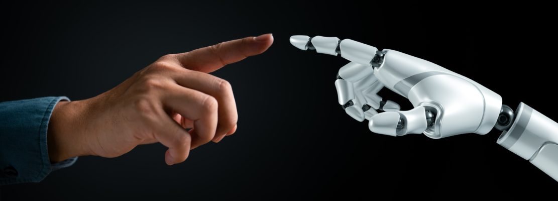 Human and robot hands reaching out to touch. Symbolizes human-AI interaction,
