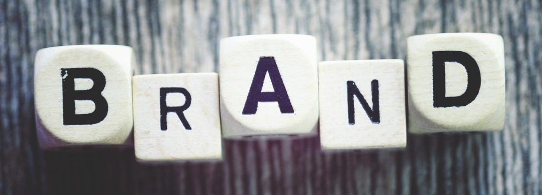 “Brand” spelled out on wooden blocks