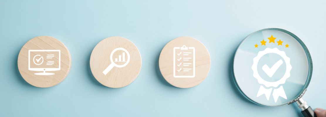 Certification and ISO quality concept illustrated with a magnifying glass highlighting