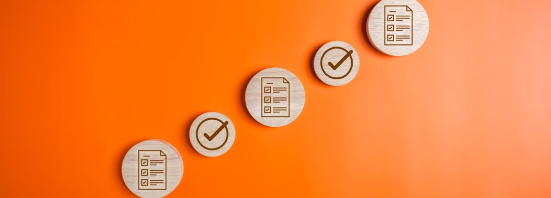 Checklist icons and magnifying glass for digital business document management